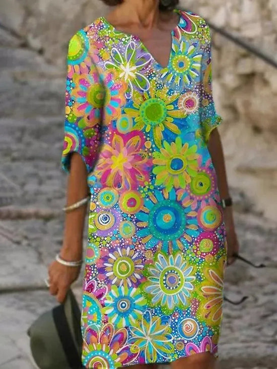 Flora - Speelse bloemenprint jurk met V-hals